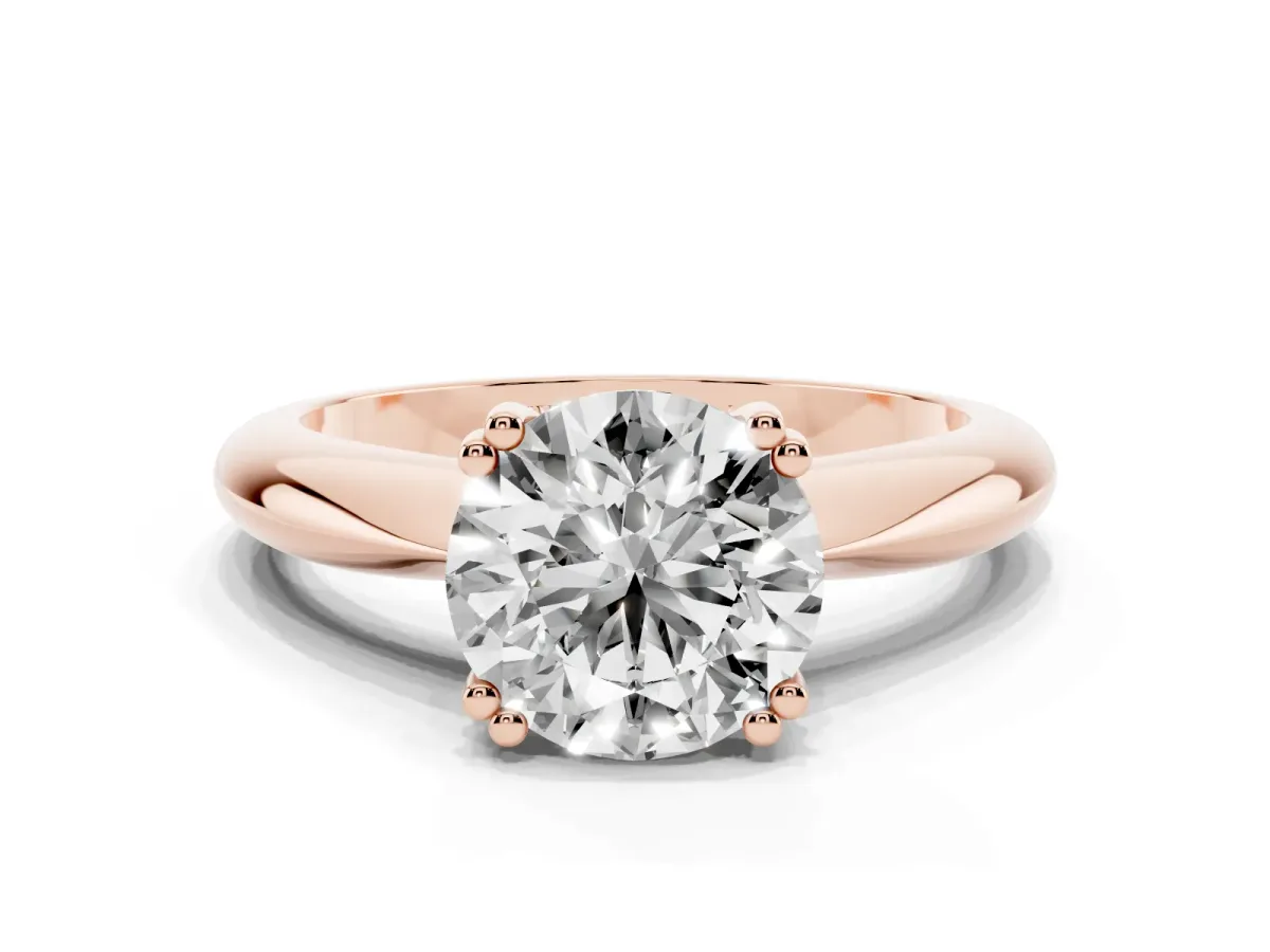 Round Cut Cut Solitaire Engagement Ring with Tapered Band and Four-Prong Setting Rose gold