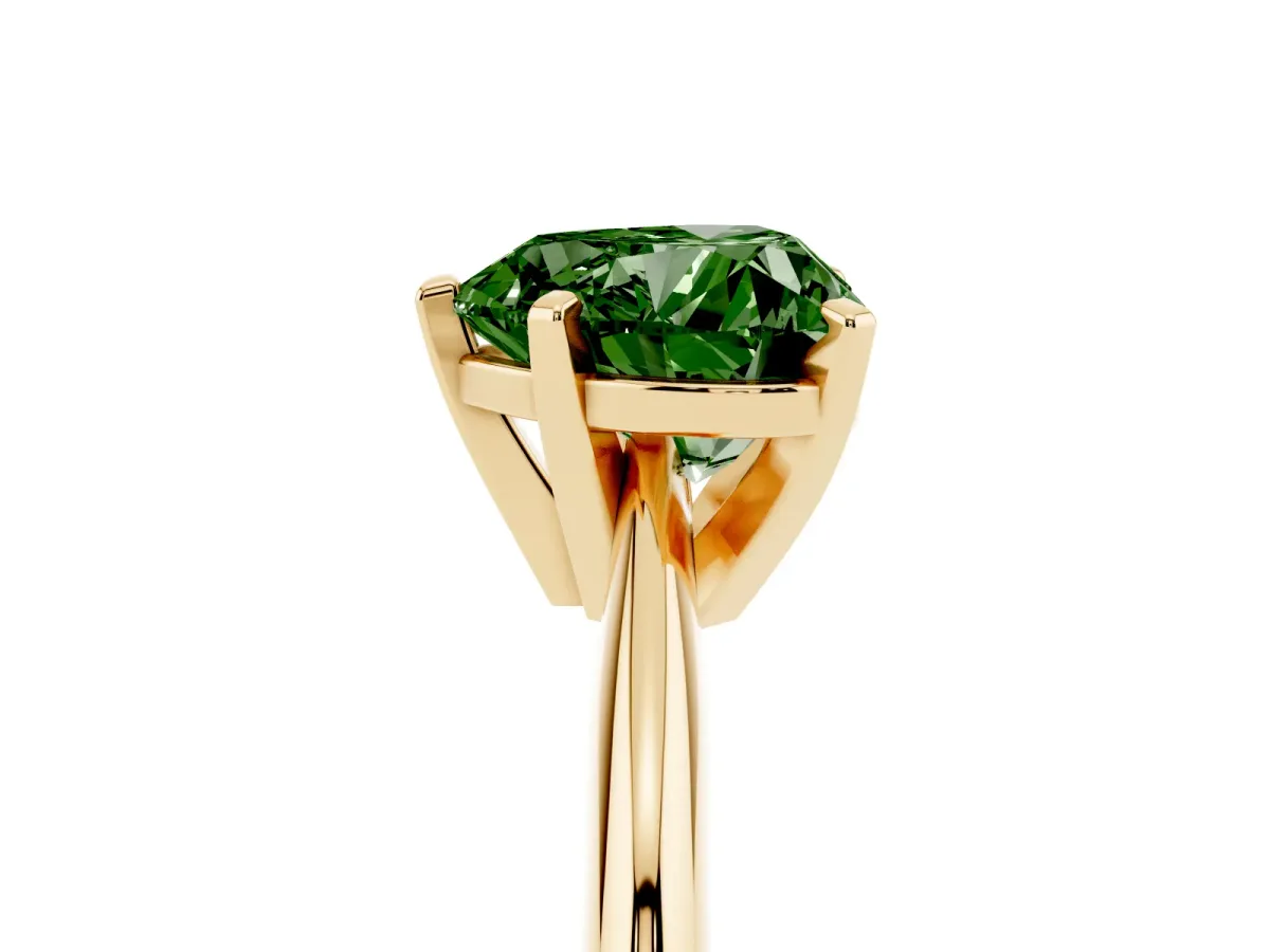 Fancy Green Heart Cut Cut Solitaire Ring with Four-Prong Setting on a Classic Band Yellow gold