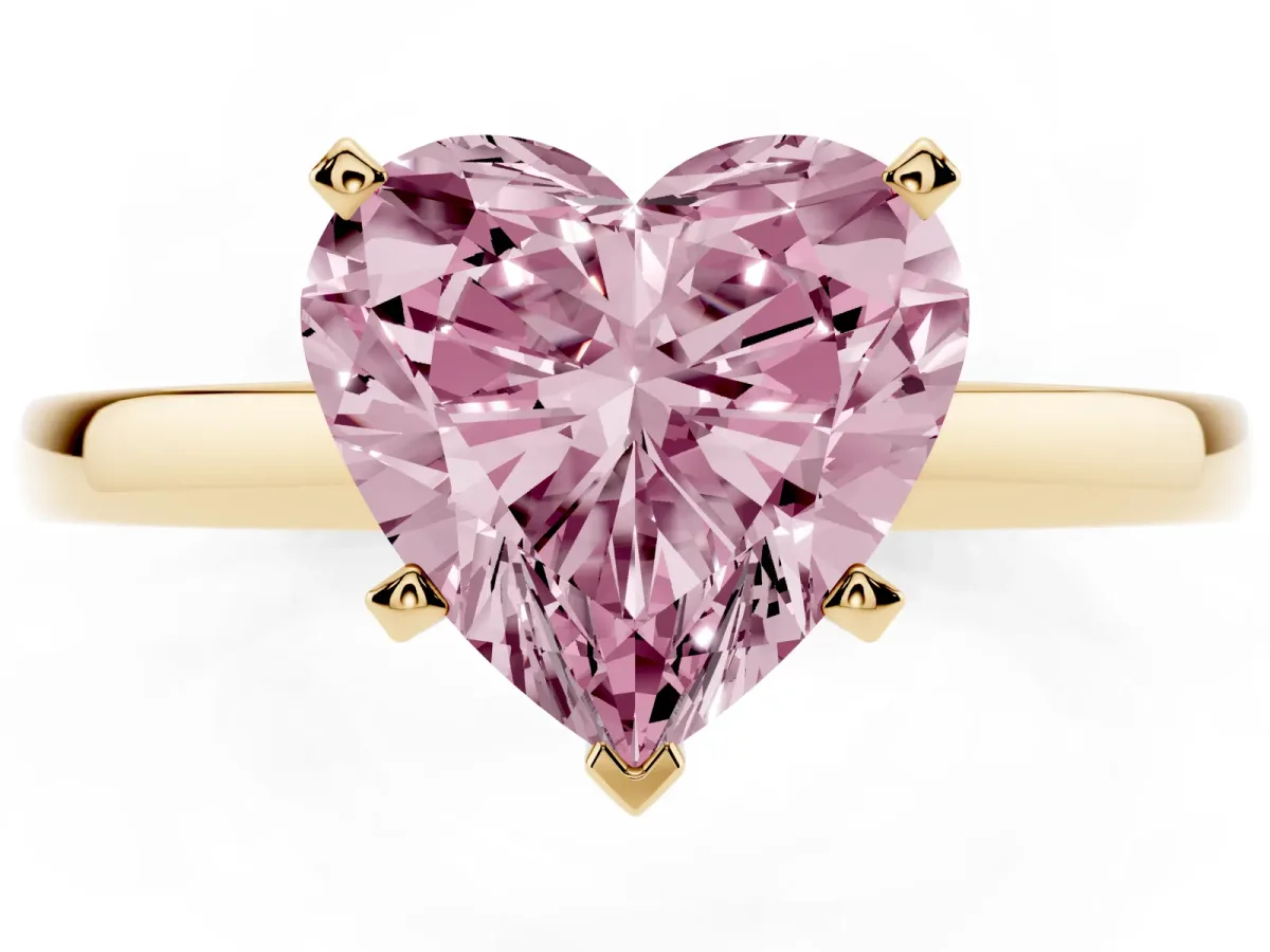 Fancy Pink Heart Cut Solitaire Diamond Engagement Ring with Four-Prong Setting on a Classic Band Yellow gold