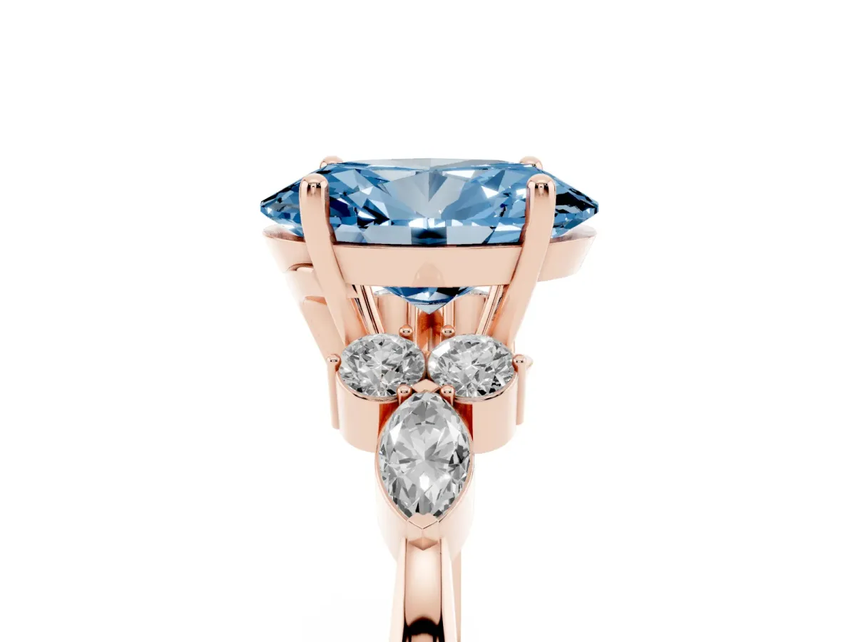 Fancy Blue Oval Cut Brilliant Diamond Solitaire Ring with Pear Side Stones and Four-Prong Setting Rose gold
