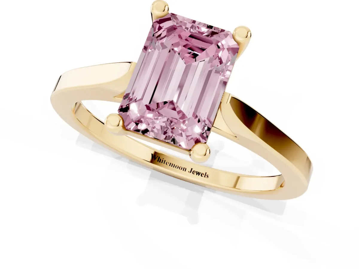 Fancy Pink Emerald Cut Solitaire Diamond Ring with Four-Prong Setting and Tapered Band Yellow gold