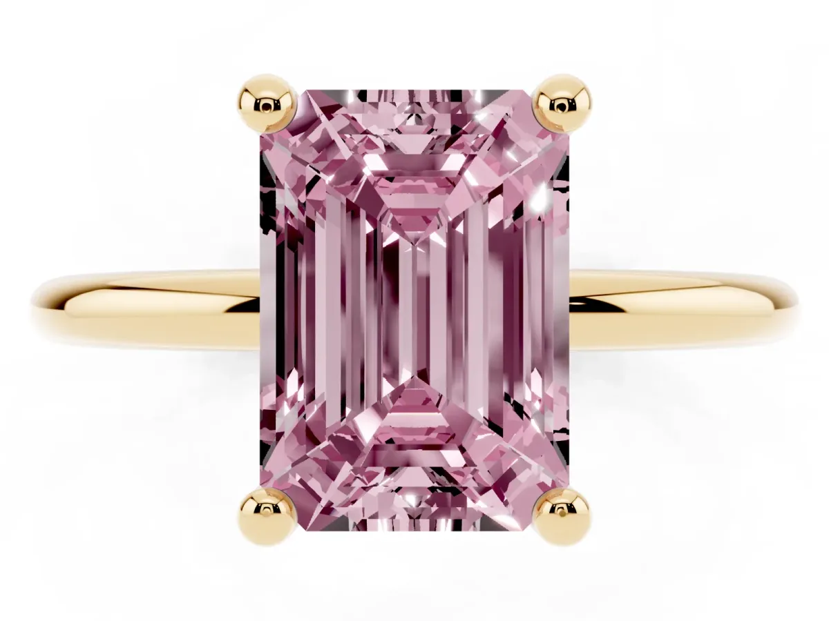 Fancy Pink Emerald Cut Solitaire Diamond Ring with 4-Prong Setting on a Classic Band Yellow gold