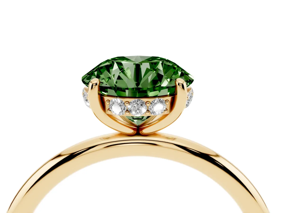 Fancy Green Round Cut Solitaire Diamond Ring with a Classic Band and Four-Prong Setting Yellow gold