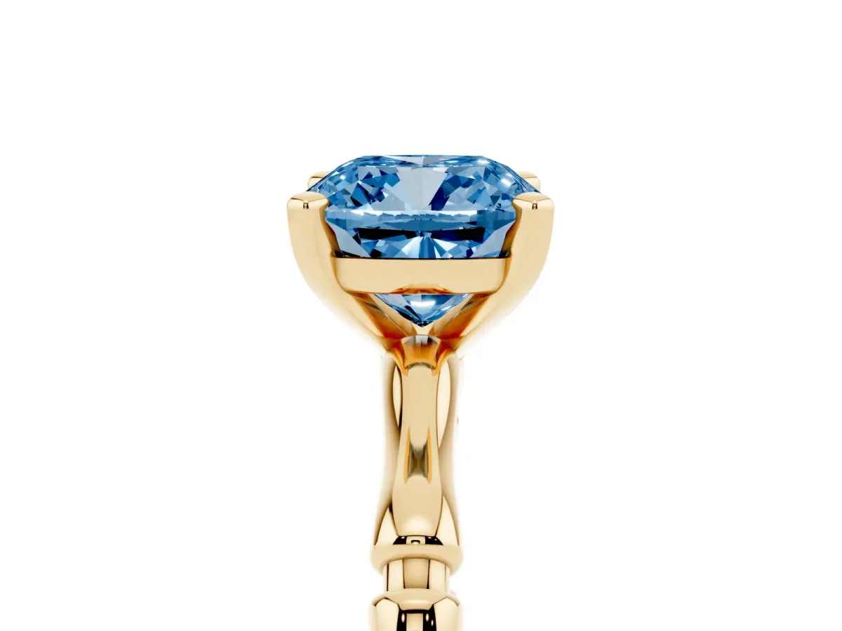 Fancy Blue Cushion Cut Solitaire Diamond Ring with Bamboo Band and Four-Prong Setting Yellow gold