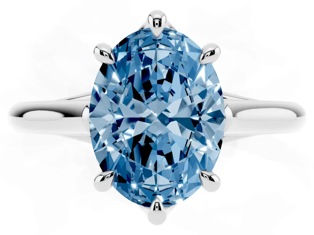 Fancy Blue Oval Cut Solitaire Engagement Ring with Six-Prong Setting and Classic Band Silver