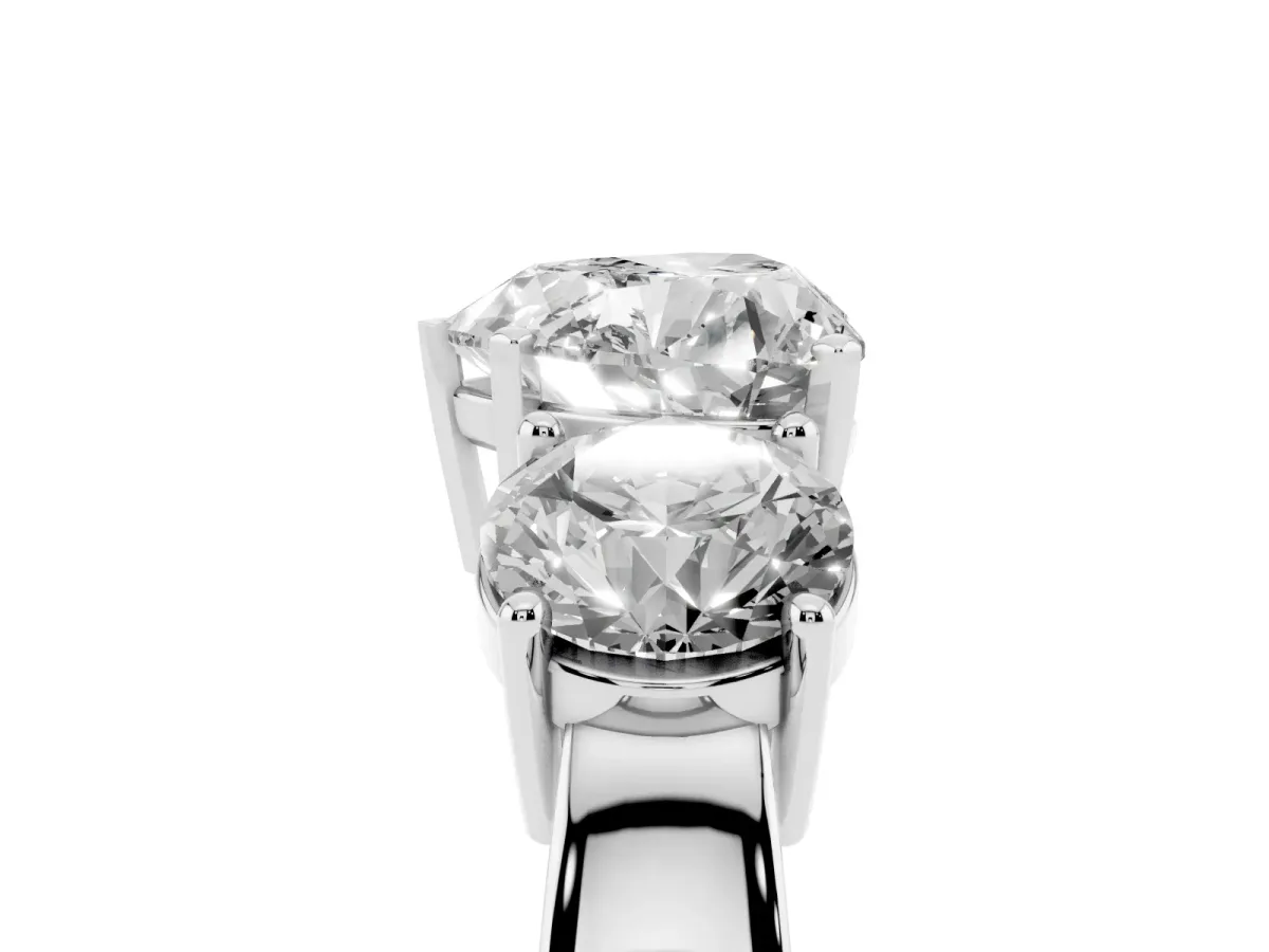 Three-Stone Heart Cut Diamond Ring with Round Side Stones, Classic Band, and Four-Prong Setting Silver