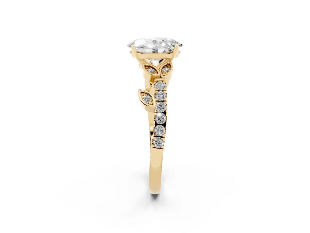 Oval Cut Solitaire Leaf-Inspired Diamond Ring with Pavé Band and Four-Prong Setting Yellow gold