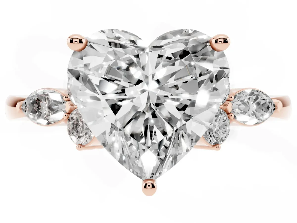 Heart Cut Brilliant Diamond Solitaire Ring with Pear Side Stones and Four-Prong Setting Rose gold