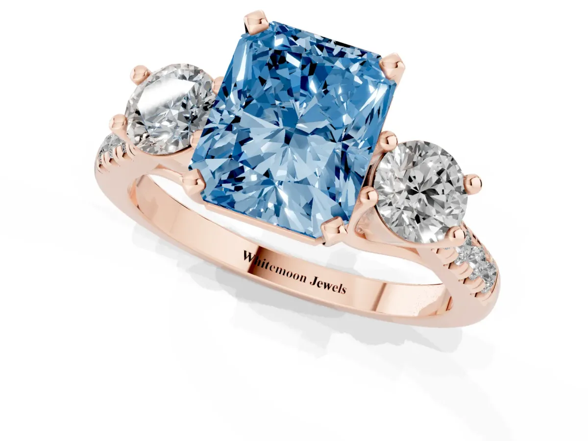 Fancy Blue Three-Stone Radiant Cut Diamond Pavé Band with Four-Prong Setting Rose gold