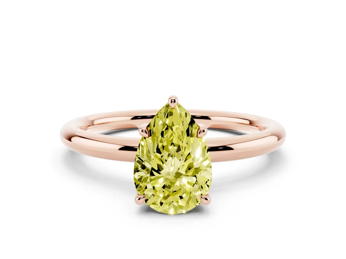 Fancy Yellow Pear Cut Diamond Solitaire Ring with Thin Band and Four-Prong Setting Rose gold