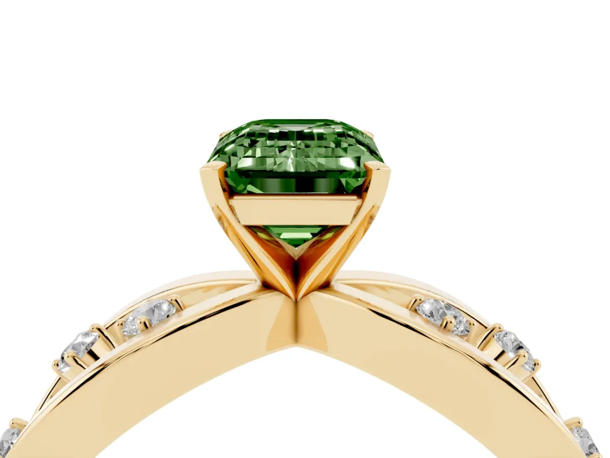 Fancy Green Emerald Cut Cut Solitaire Diamond with Side Stones on Criss-Cross Band and Four-Prong Setting Yellow gold