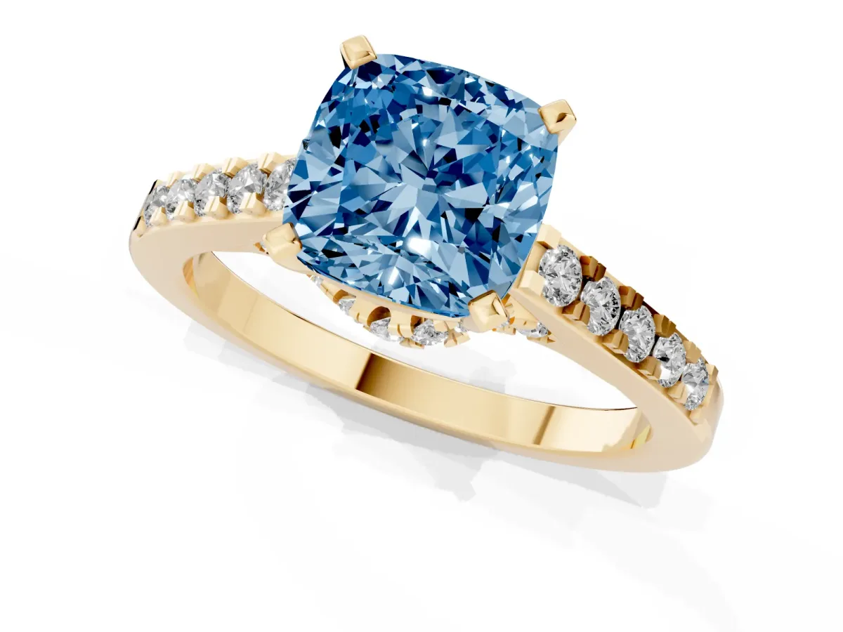 Fancy Blue Cushion Cut Diamond Solitaire Ring with Crossover Gallery and Round Pavé Band Yellow gold
