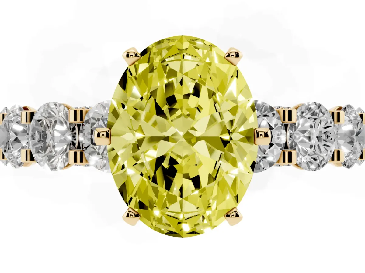 Fancy Yellow Oval Cut Diamond Side Stone Engagement Ring with Four-Prong Setting Yellow gold