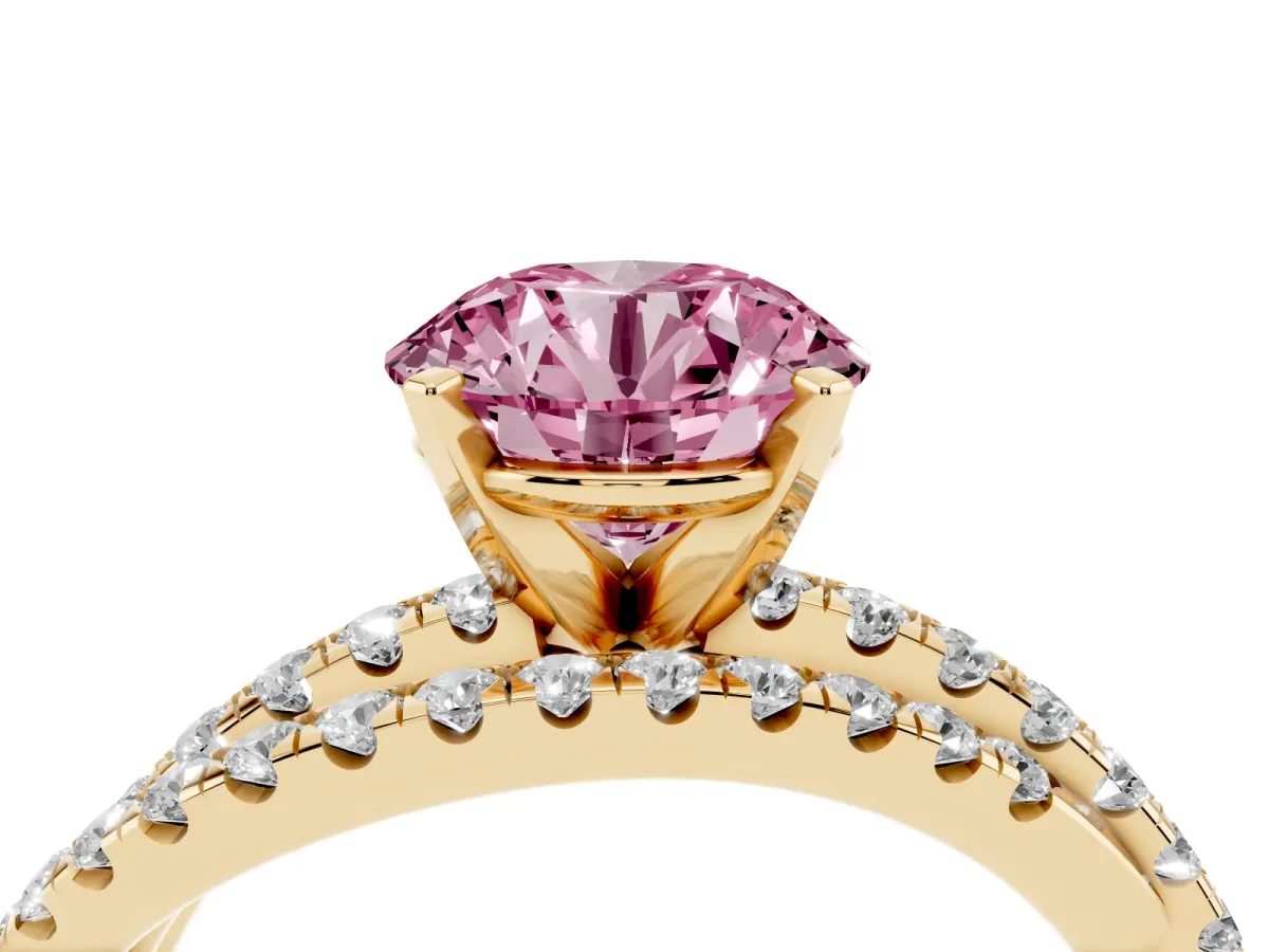 Fancy Pink Round Cut Solitaire Twist Band with Pavé Setting and Four-Prong Setting Yellow gold