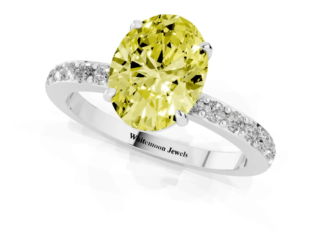 Fancy Yellow Oval Cut Diamond Pavé Engagement Ring with Round Accents and Prong Setting Silver