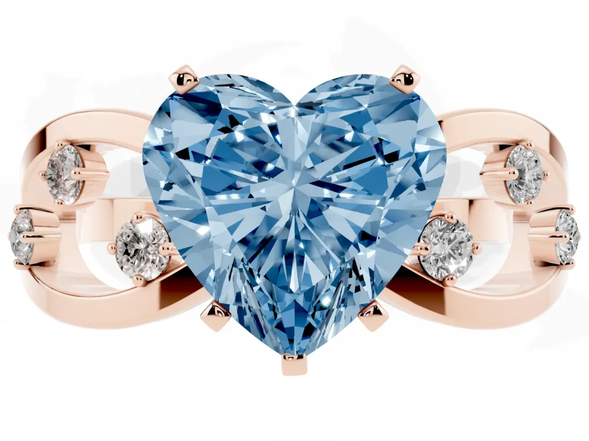 Fancy Blue Heart Cut Cut Solitaire Diamond with Side Stones on Criss-Cross Band and Four-Prong Setting Rose gold