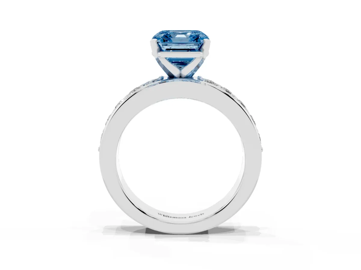 Fancy Blue Asscher Cut Diamond Engagement Ring with Channel Set Round Band and Prong Setting Silver