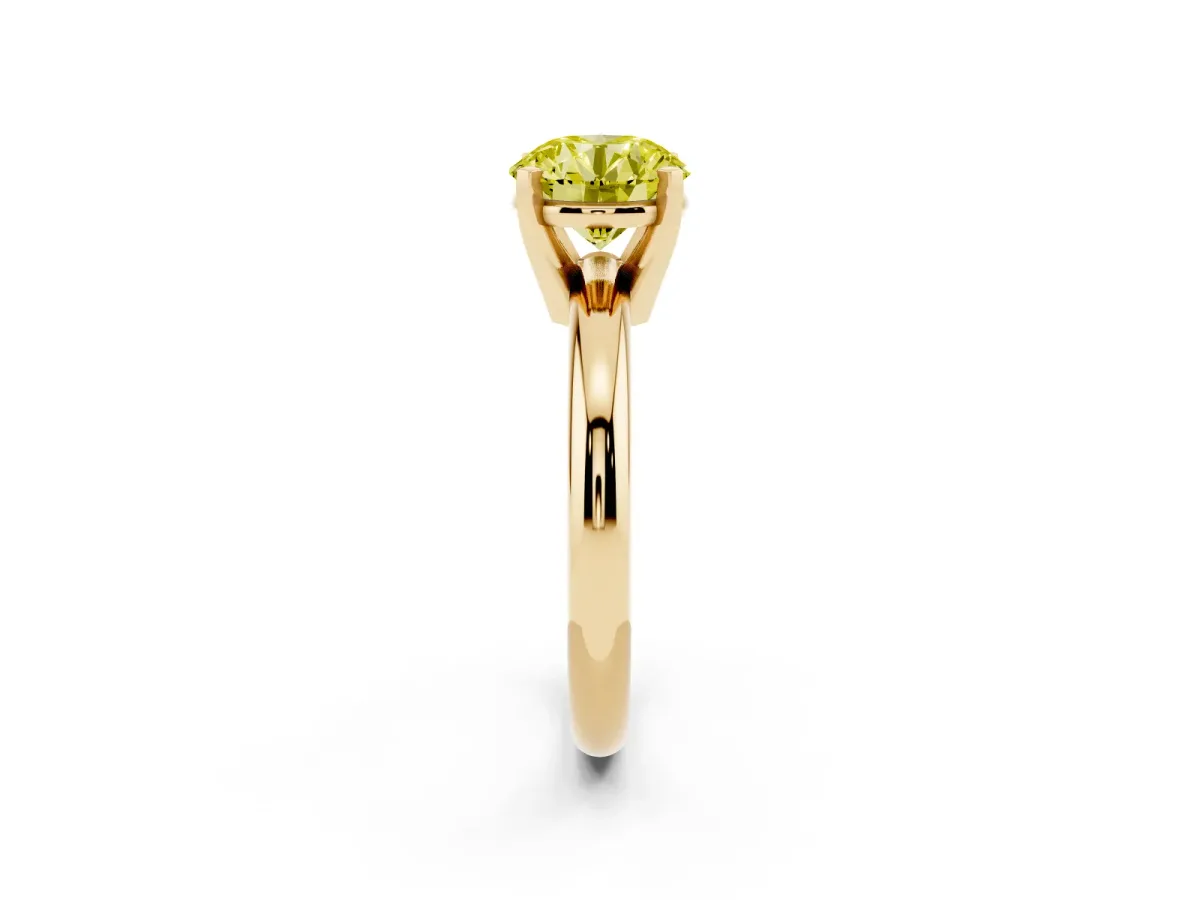 Fancy Yellow Round Cut Diamond Solitaire Engagement Ring with Round Band and Four-Prong Setting Yellow gold