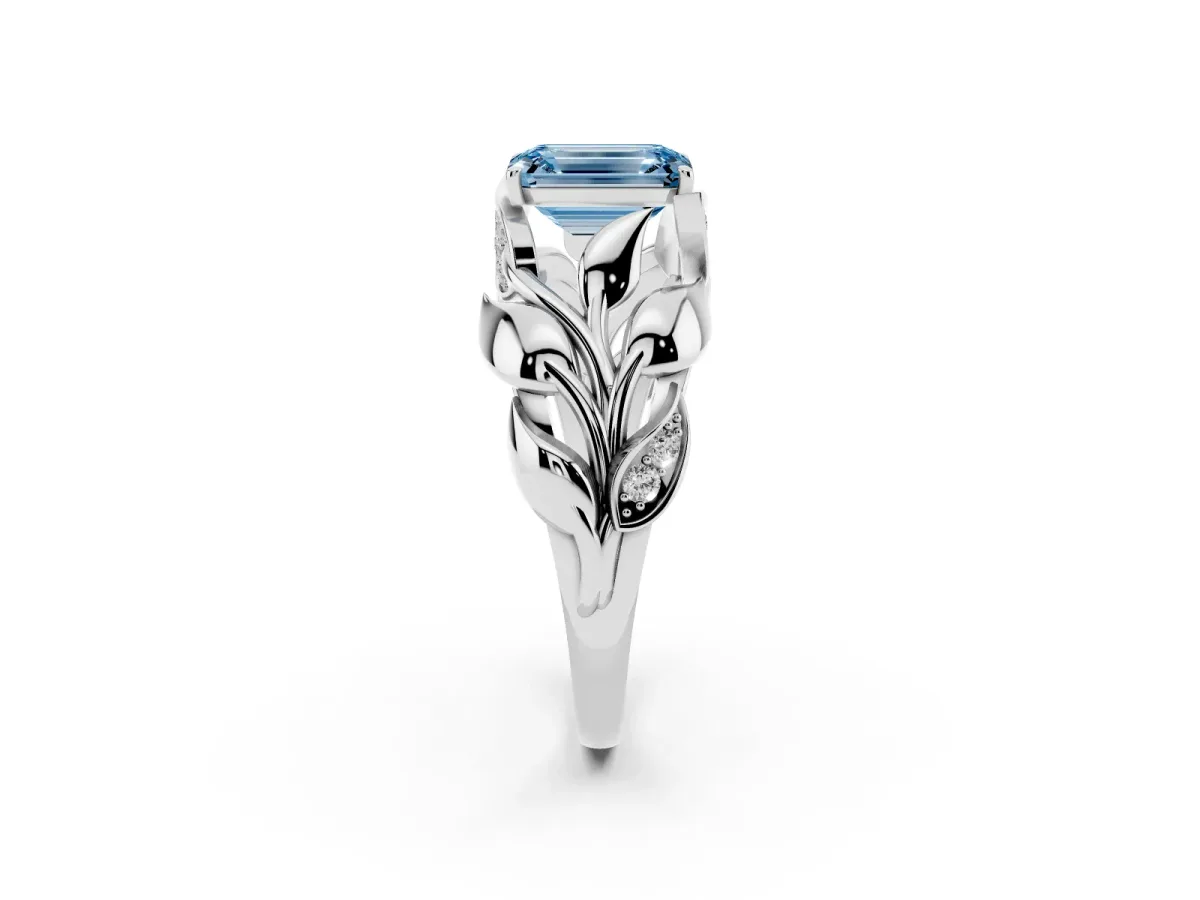 Fancy Blue Emerald Cut Diamond Leaf-Inspired Engagement Ring with Round Accents and Prong Setting Silver