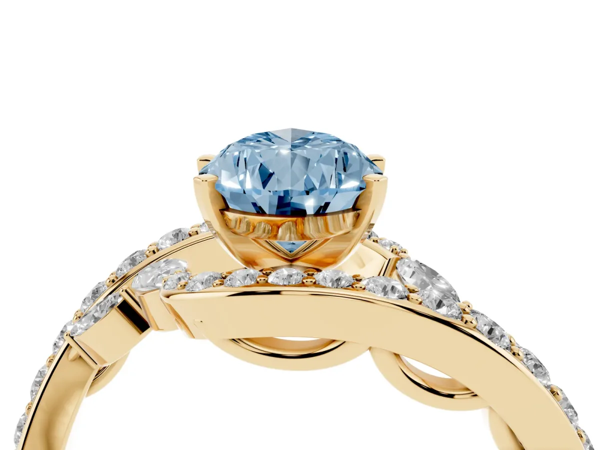 Fancy Blue Pear Cut Solitaire with Pavé Twist Band and Four-Prong Setting Yellow gold