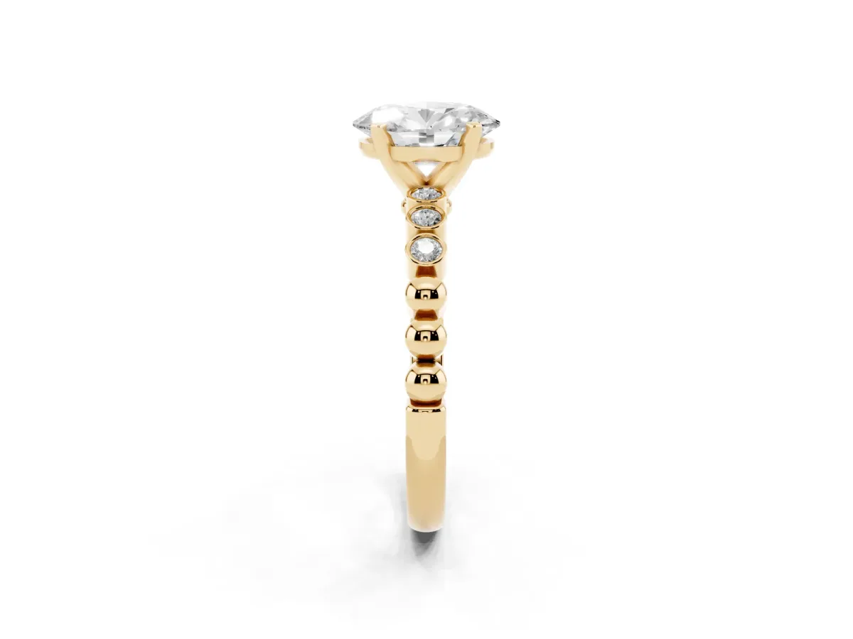Oval Cut Solitaire Bezel Accent Diamond Engagement Ring with Beaded Band and Four-Prong Setting Yellow gold