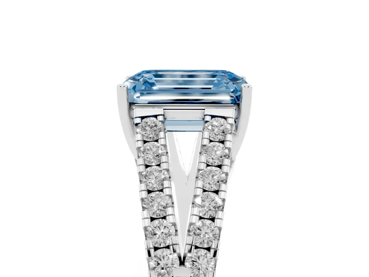 Fancy Blue Emerald Cut Diamond Split Shank Engagement Ring with Round Pavé and Prong Setting Platinum