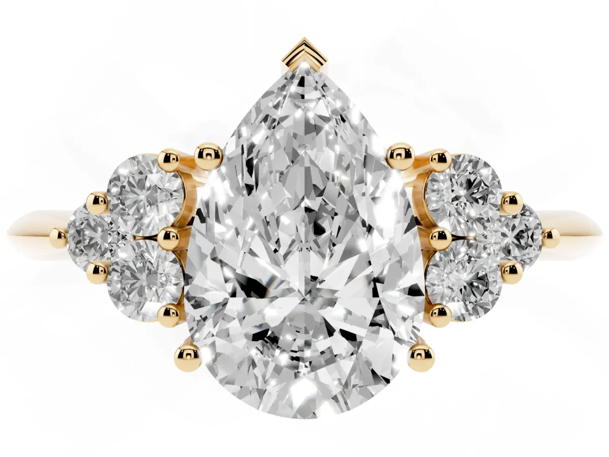 Pear Cut Cut Diamond Cluster Ring with Solitaire Band and Four-Prong Setting Yellow gold