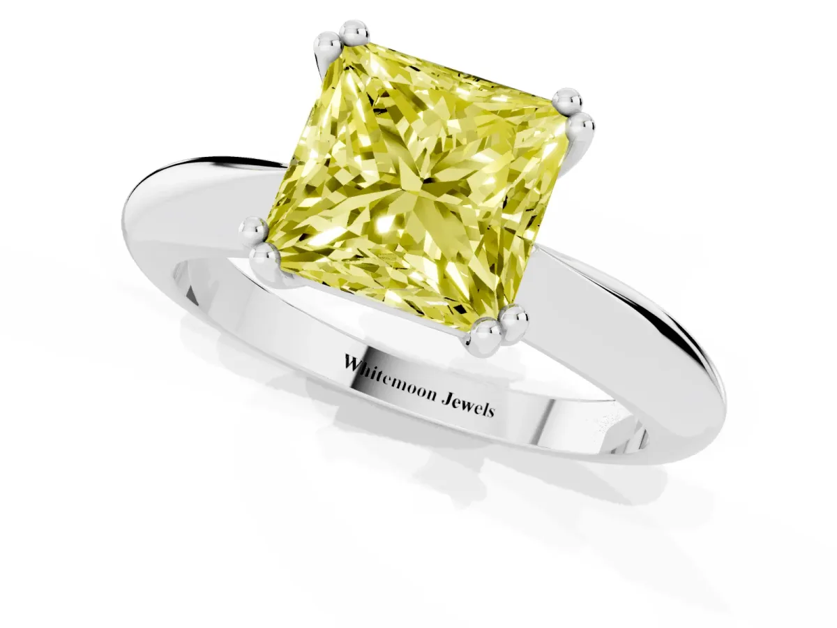 Fancy Yellow Princess Cut Cut Solitaire Engagement Ring with Tapered Band and Four-Prong Setting Platinum