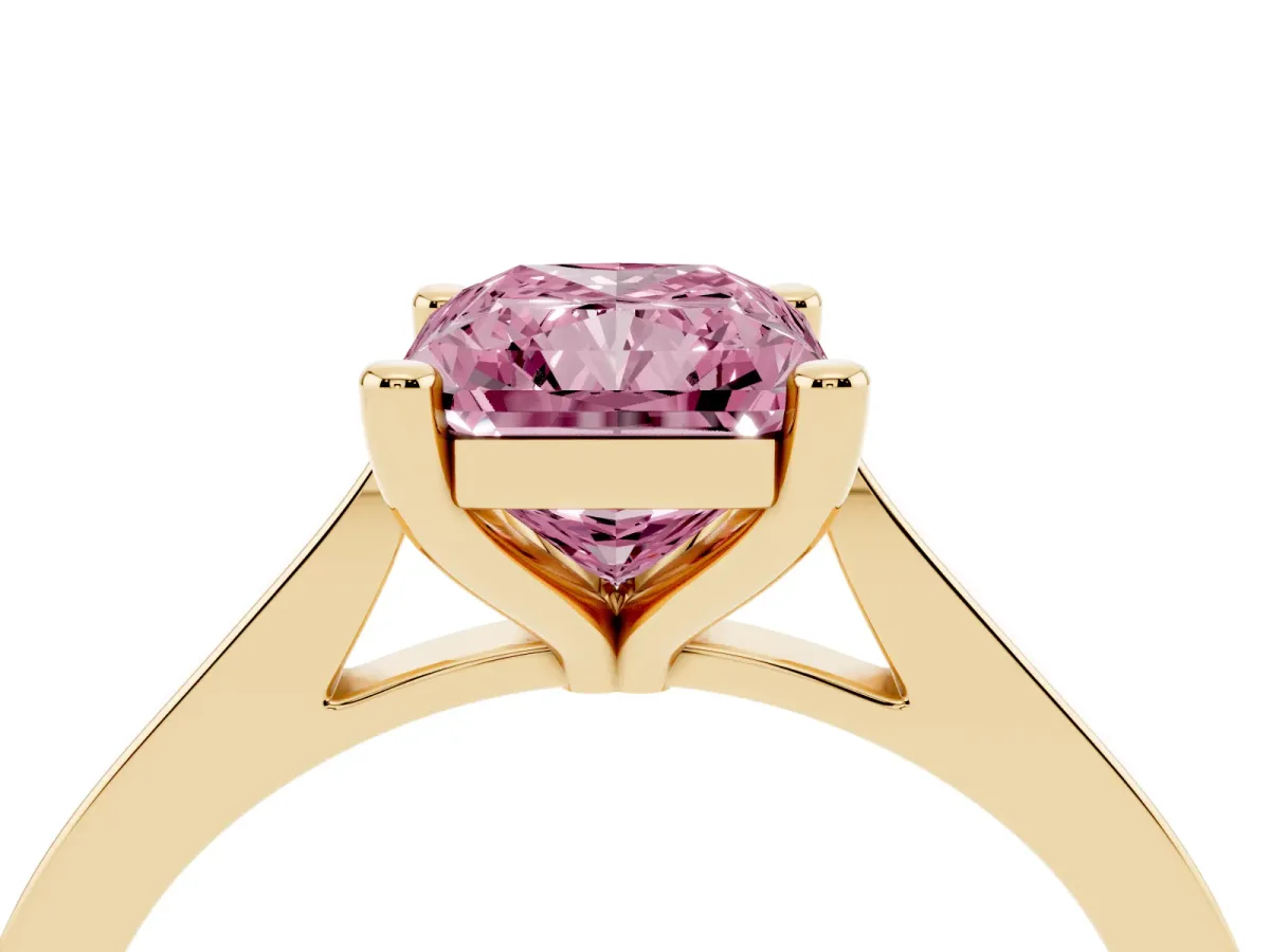 Fancy Pink Radiant Cut Solitaire Diamond Ring with Four-Prong Setting and Tapered Band Yellow gold