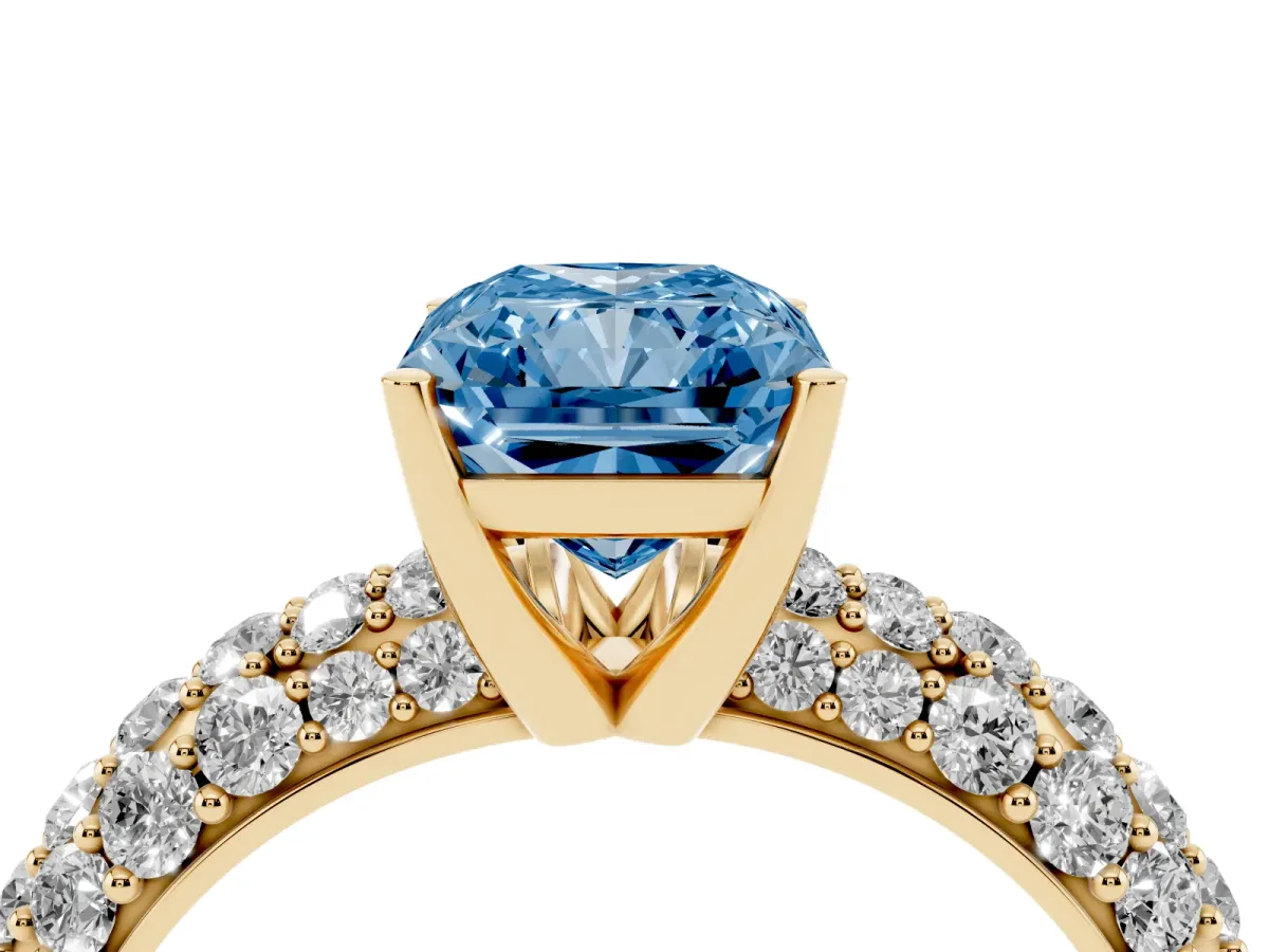 Fancy Blue Radiant Cut Diamond Pavé Band Solitaire Ring with Four-Prong Setting Yellow gold