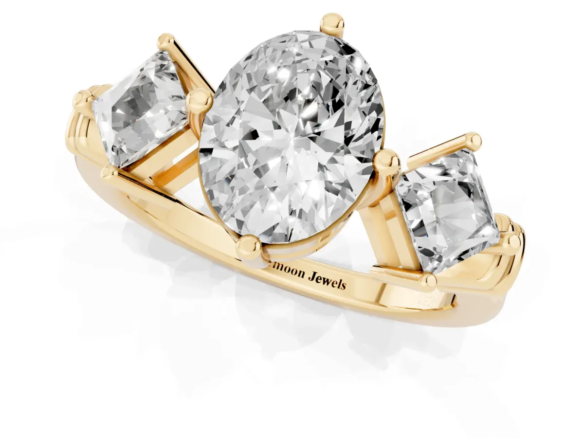 Three-Stone Oval Cut and Princess Cut Diamond Ring with Channel Band and Four-Prong Setting Yellow gold