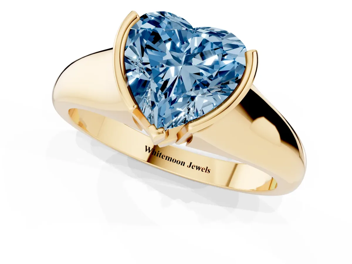 Fancy Blue Heart Cut Solitaire Tension Set Diamond Ring with Split Shank Band Yellow gold