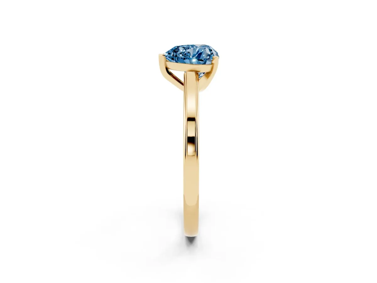 Fancy Blue Heart Cut Solitaire Diamond Ring with Four-Prong Setting and Classic Band Yellow gold