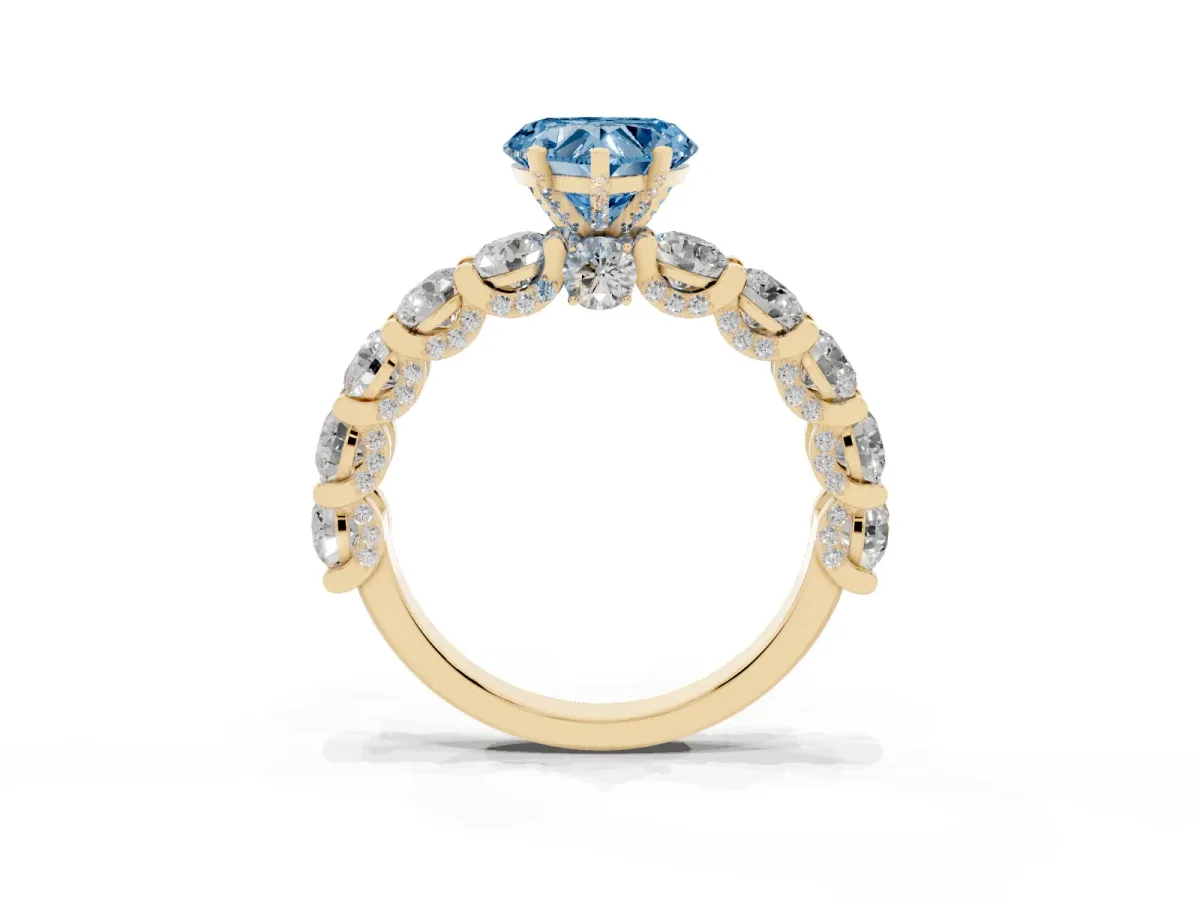 Fancy Blue Heart Cut Diamond Side Stone Engagement Ring with Four-Prong Setting Yellow gold