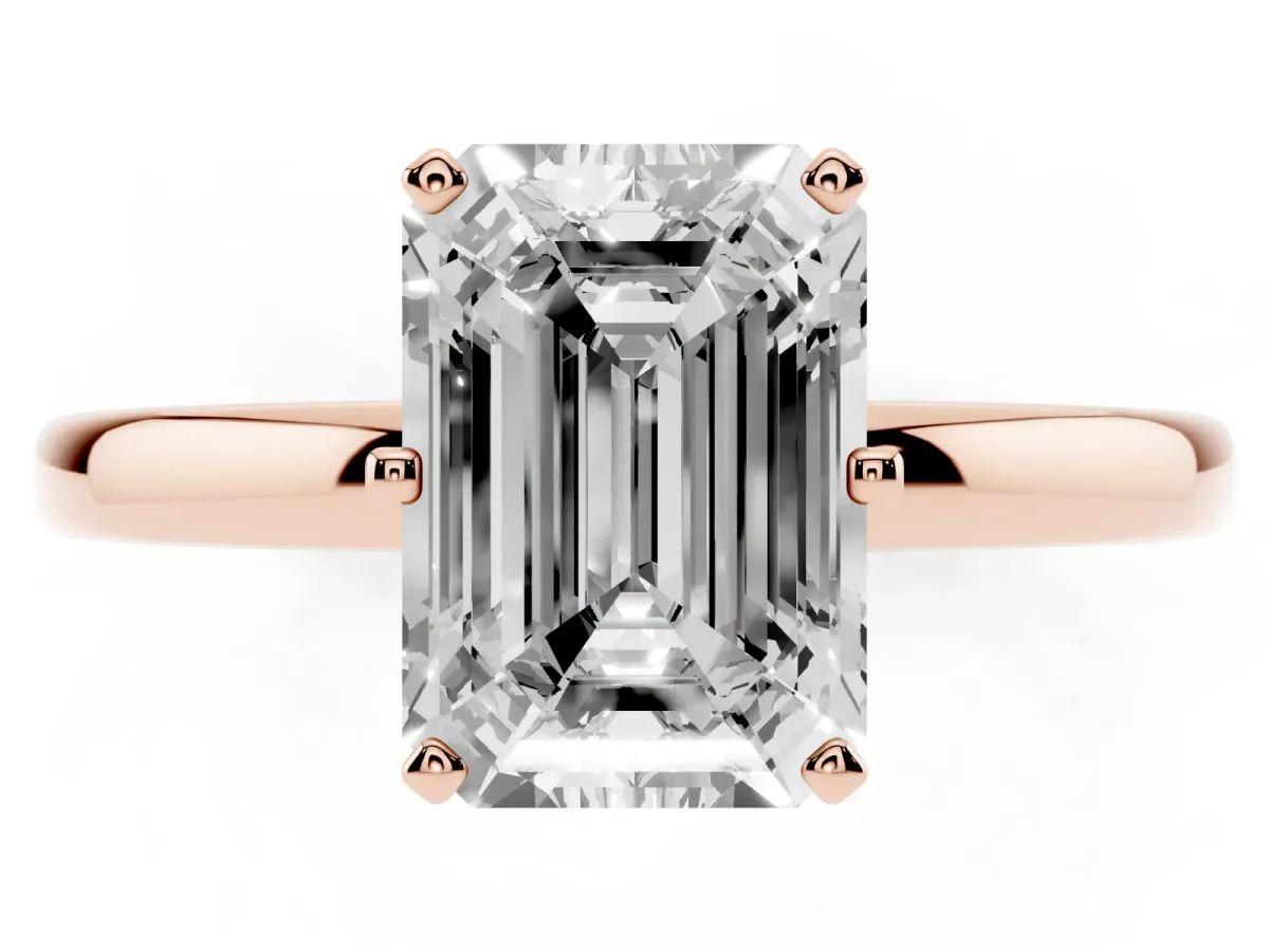 Emerald Cut Solitaire Diamond Ring with Six-Prong Setting on a Classic Band Rose gold