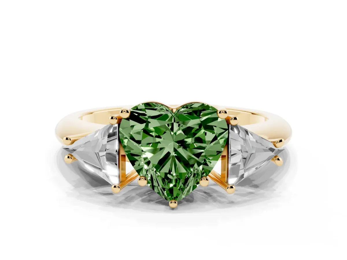 Fancy Green Three-Stone Heart Cut Diamond Engagement Ring with Trillion Side Stones and Prong Setting Yellow gold