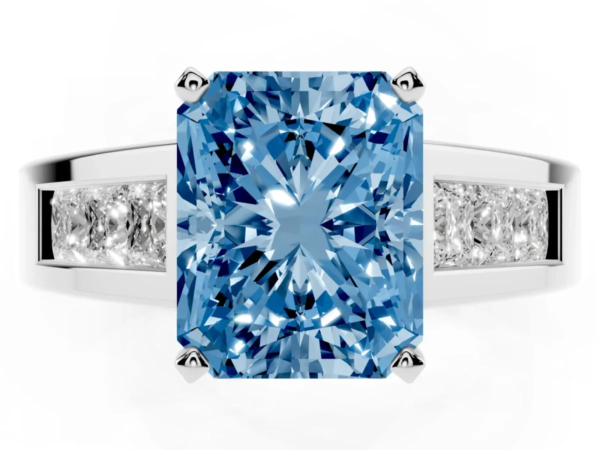 Fancy Blue Radiant Cut Cut Channel Set Solitaire Ring with Four-Prong Setting Silver