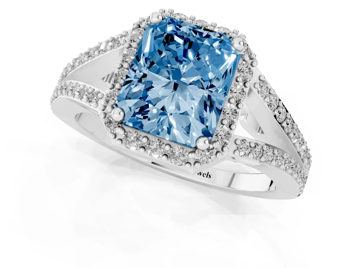 Fancy Blue Radiant Cut Halo Split Shank Pave Diamond Ring with Four-Prong Setting Silver