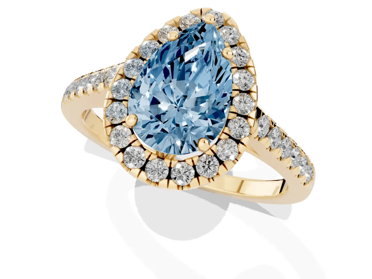 Fancy Blue Pear Cut Halo Pavé Diamond Engagement Ring with Four-Prong Setting Yellow gold
