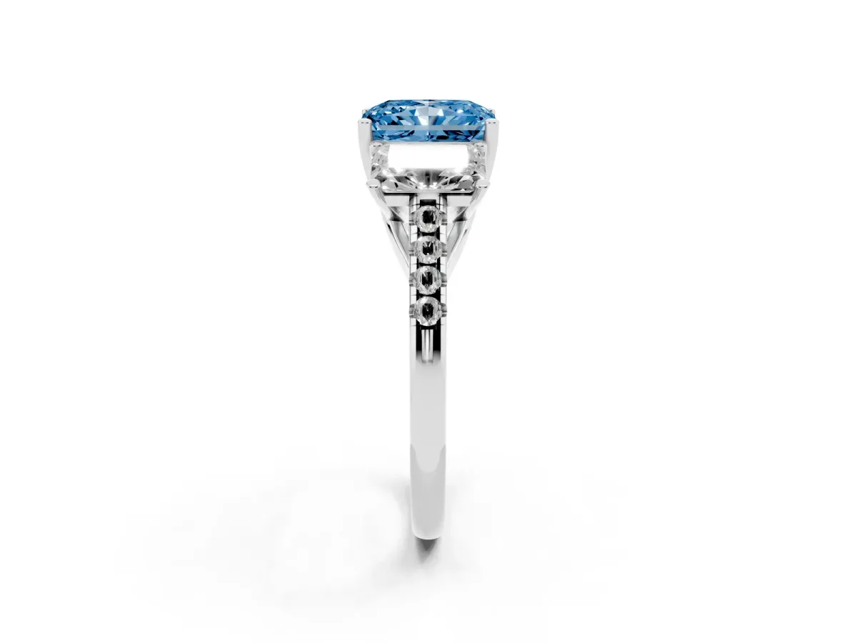 Fancy Blue Three-Stone Radiant Cut Diamond Ring with Round Pavé Band and Prong Setting Silver