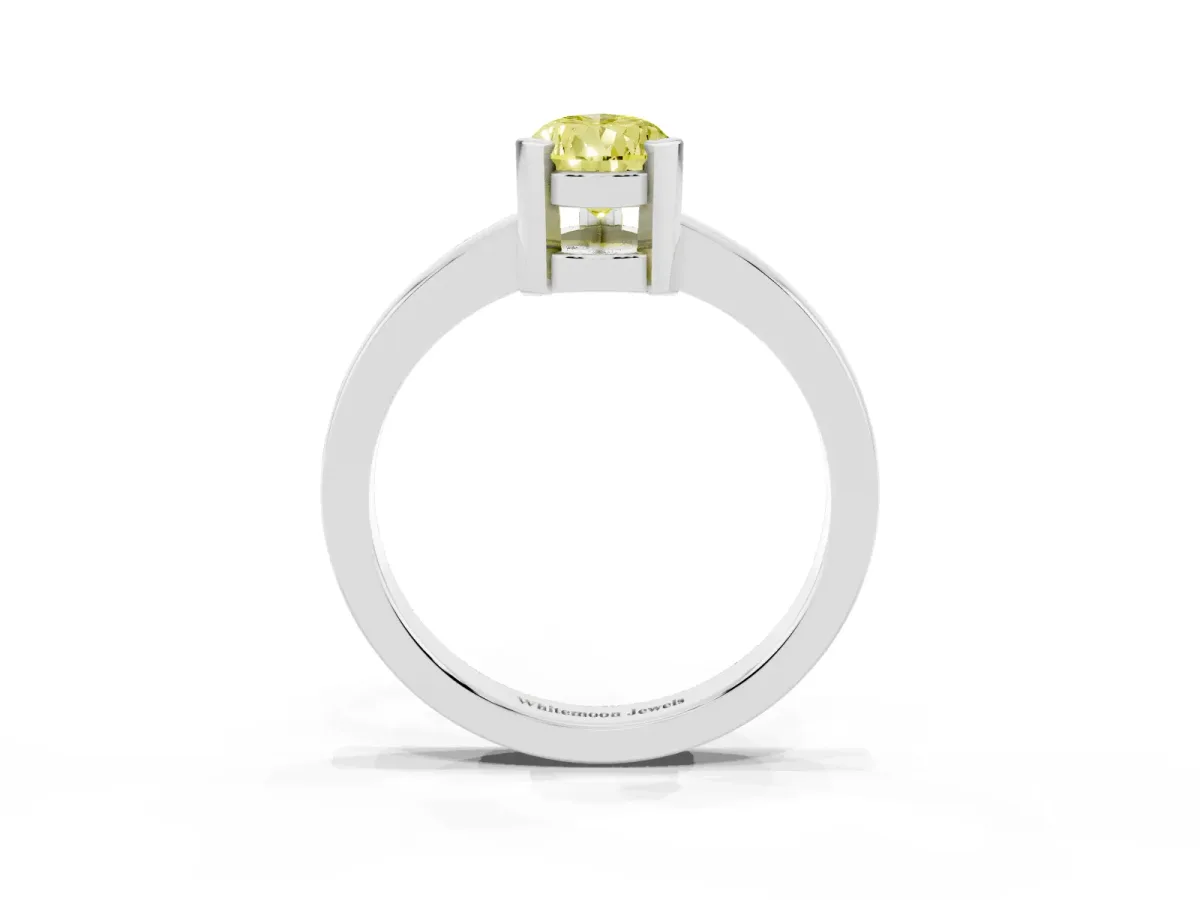 Fancy Yellow Pear Cut Cut Solitaire Ring with Four-Prong Setting and Classic Band Platinum