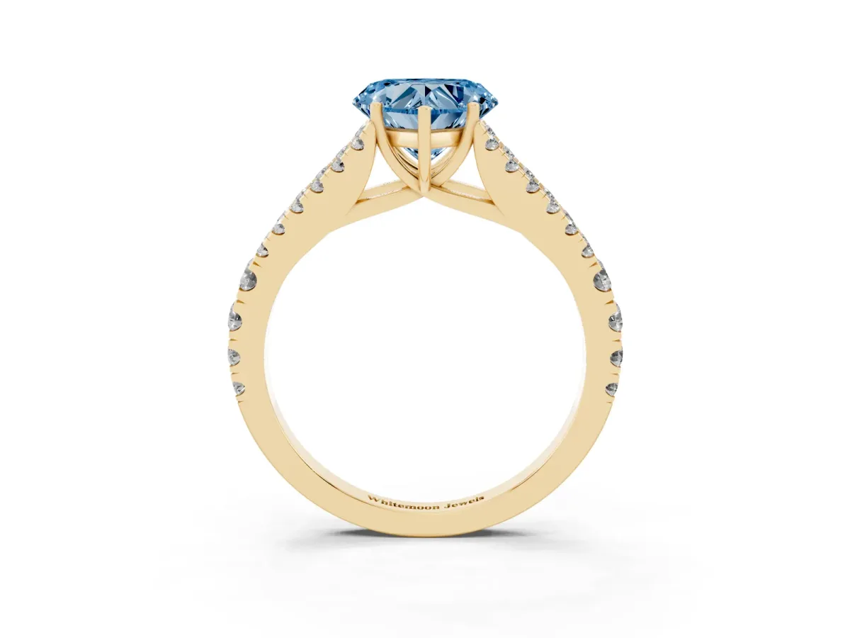 Fancy Blue Heart Cut Diamond Split Shank Pavé Engagement Ring with Four-Prong Setting Yellow gold