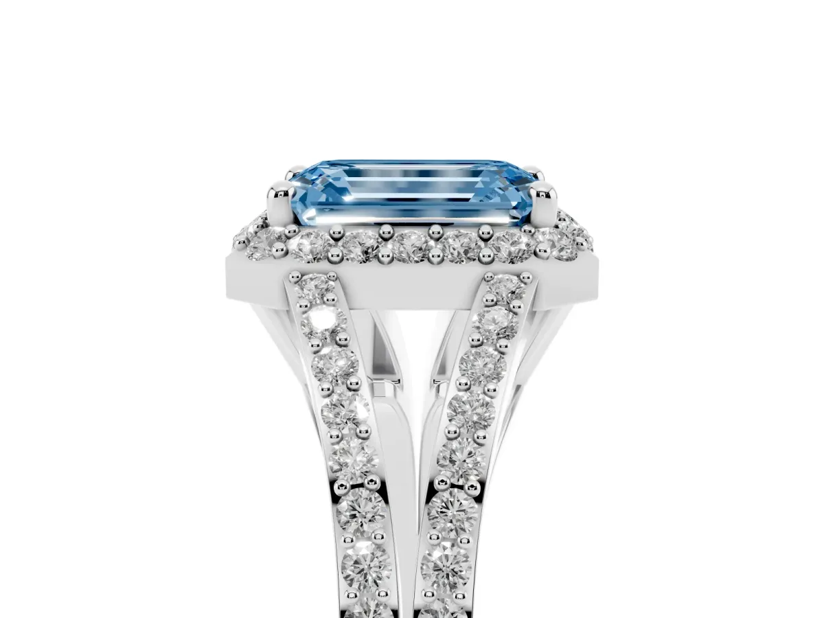 Fancy Blue Emerald Cut Halo Split Shank Pave Diamond Ring with Four-Prong Setting Silver