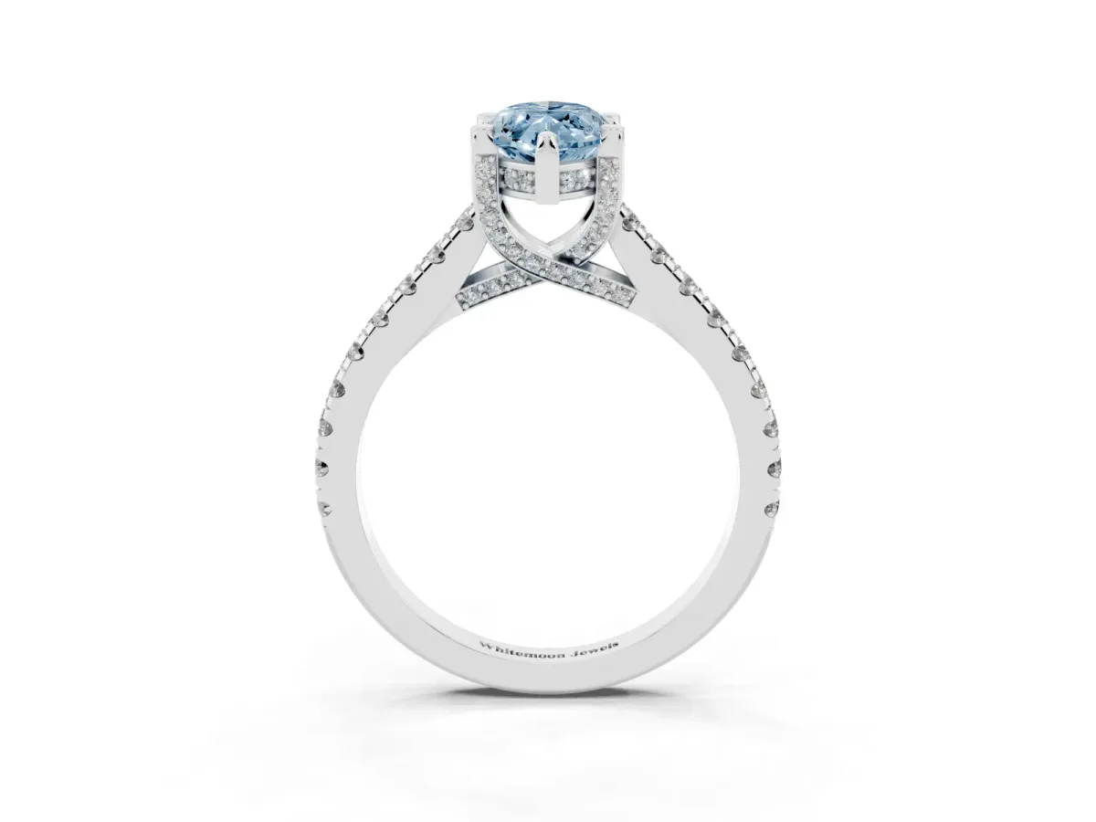 Fancy Blue Marquise Cut Brilliant Diamond Solitaire with Pavé Band and Four-Prong Setting Silver