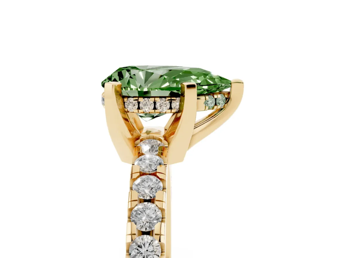 Fancy Green Pear Cut Diamond Solitaire Ring with Round Pavé Band and Four-Prong Setting Yellow gold