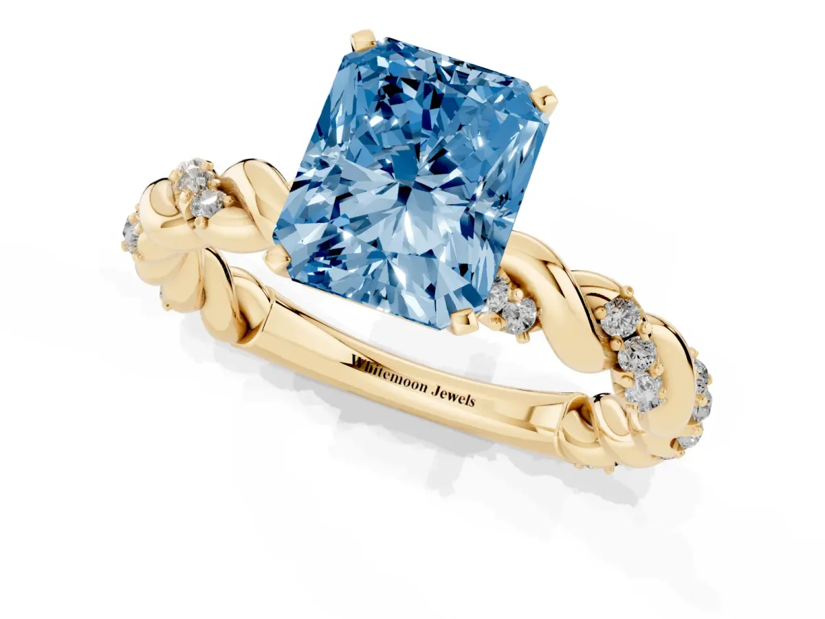 Fancy Blue Radiant Cut Diamond Solitaire Ring with Twisted Band and Pavé Accents Yellow gold