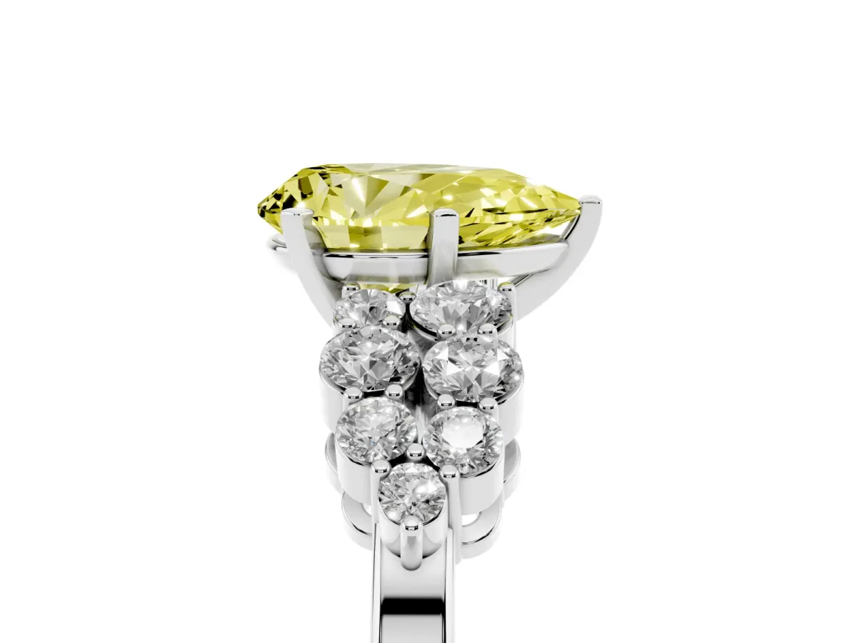 Fancy Yellow Pear Cut Cluster Diamond Engagement Ring with Pavé Band and Four-Prong Setting Platinum