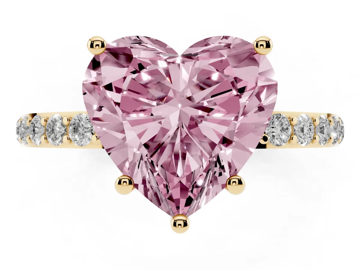 Fancy Pink Heart Cut Diamond Solitaire Ring with Round Pavé Shoulders and Prong Setting Yellow gold