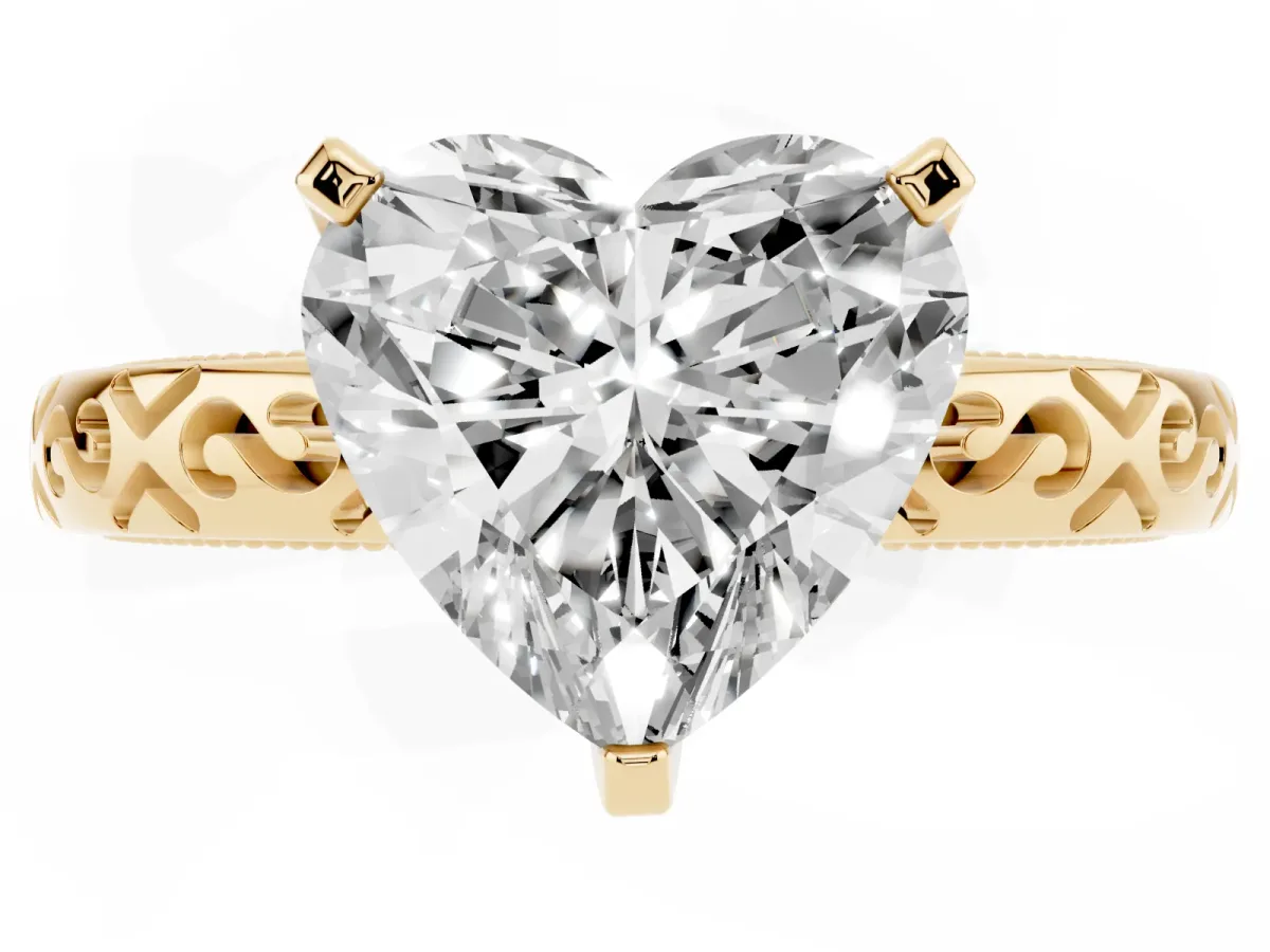 Heart Cut Solitaire Engagement Ring with Scrollwork Band and Four-Prong Setting Yellow gold