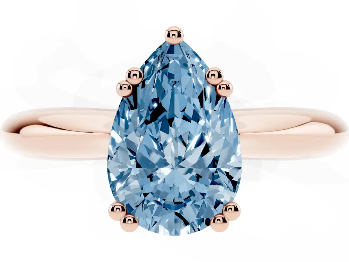 Fancy Blue Pear Cut Cut Solitaire Engagement Ring with Tapered Band and Four-Prong Setting Rose gold